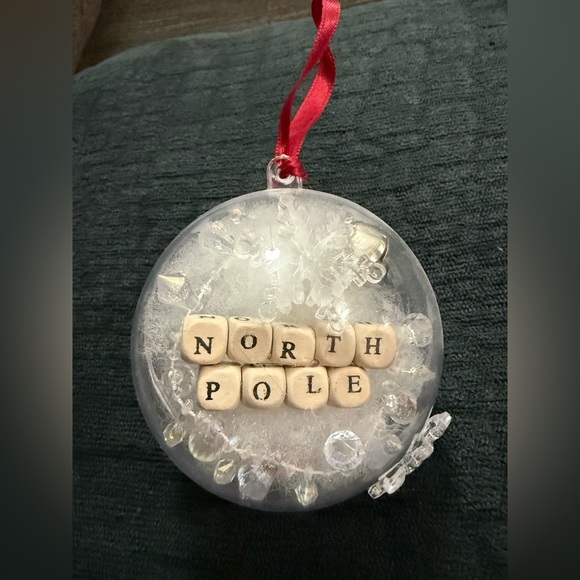North Pole Holiday Ornament with Red Ribbon - Picture 1 of 2